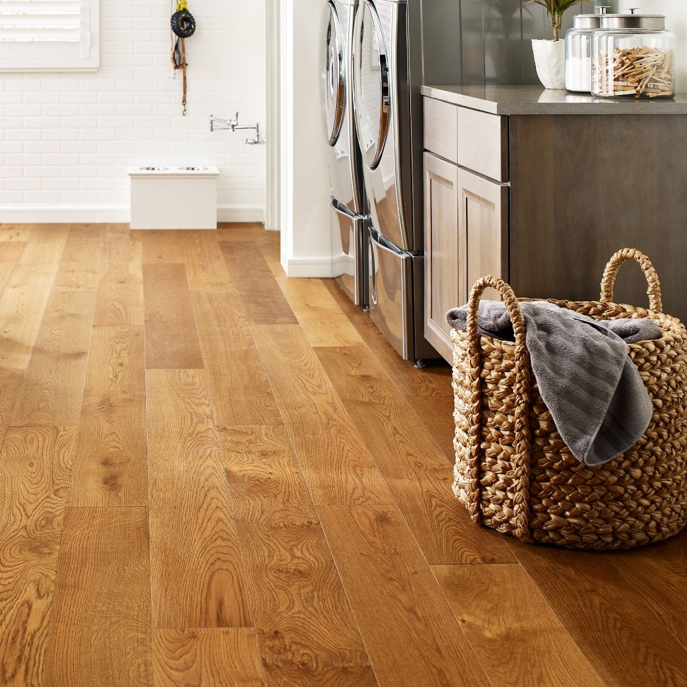 laundry area with hardwood flooring - Kallod Carpet, Inc