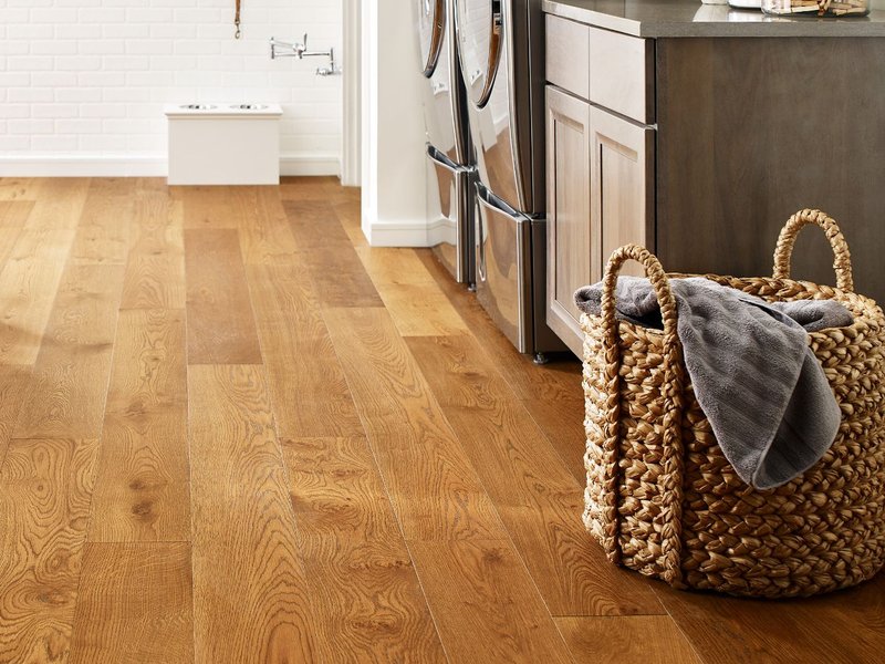 laundry area with hardwood flooring - Kallod Carpet, Inc