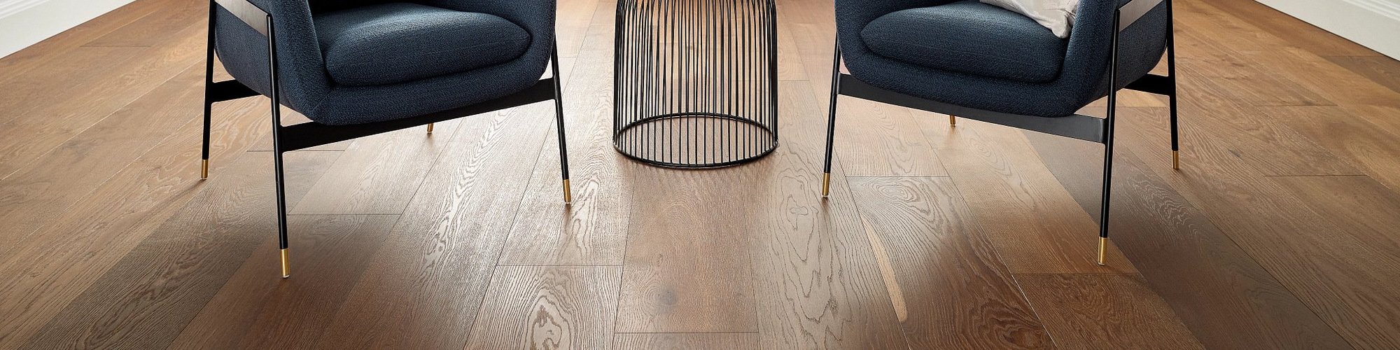 two arm chairs on wood floors - Kallod Carpet, Inc